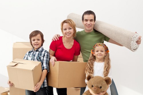 Careful loading of furniture for a removal service in Aldersbrook