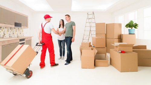 Packing and loading items for a house move in Aldersbrook